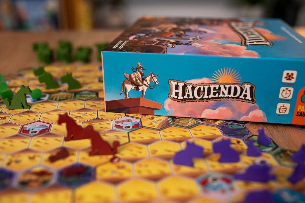 Gen Con starts this week: 11 tabletop releases worth standing in line for 32 The box for the board game Hacienda placed above the game board