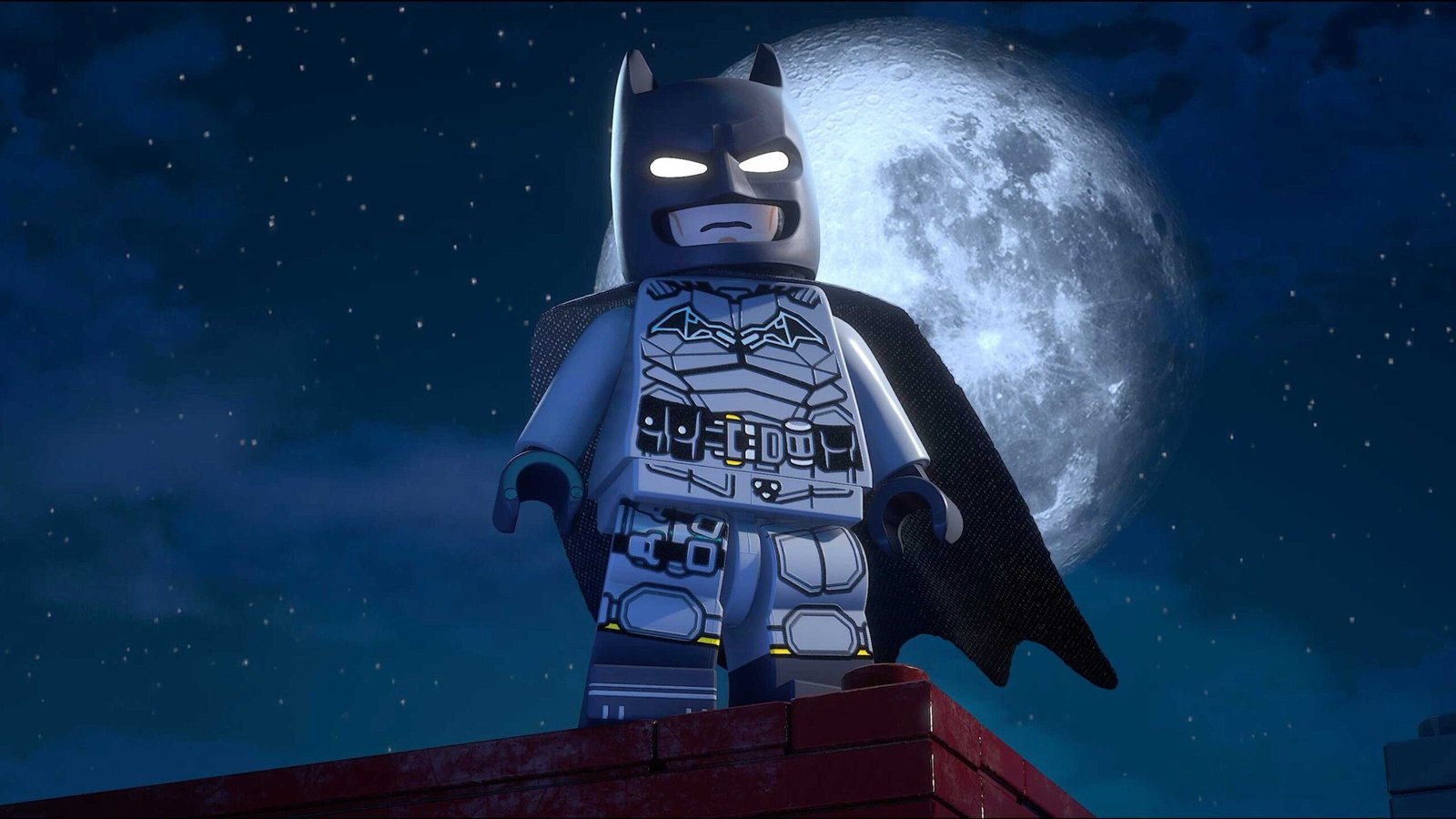 Batman stands on a building in Lego Batman Legacy of the Dark Knight