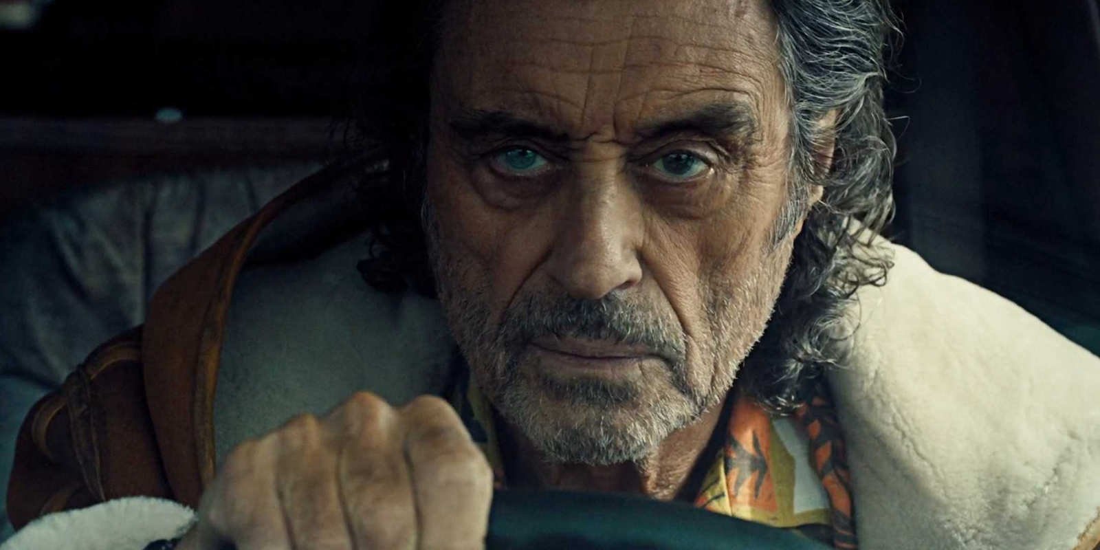 Mr. Wednesday (Ian McShane) driving a car in American Gods