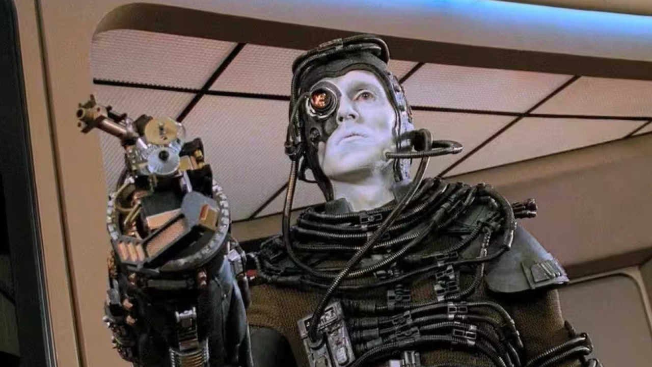 How Battlestar Galactica Spent 14 Years Waiting To Beat Star Trek At Its Own Game 27 A borg pointing its weapon in Star Trek: The Next Generation.