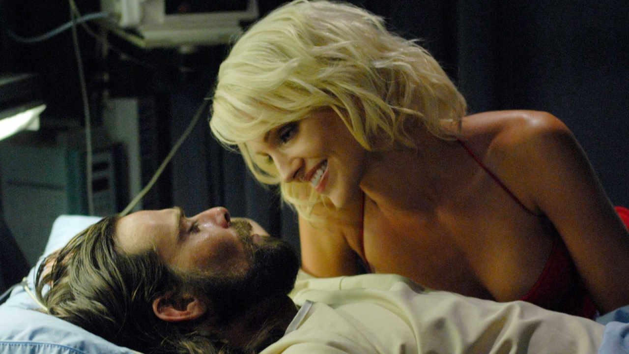 How Battlestar Galactica Spent 14 Years Waiting To Beat Star Trek At Its Own Game 28 James Callis and Tricia Helfer in Battlestar Galactica