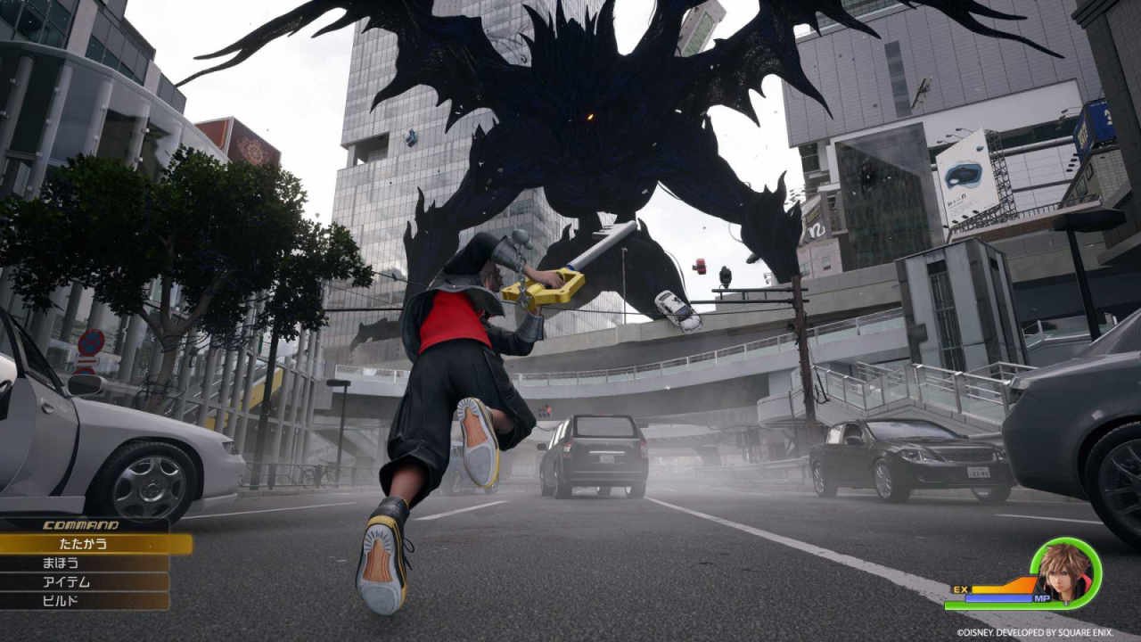Sora battles a giant Heartless on the streets of Shibuya (aka Quadratum) in Kingdom Hearts 4