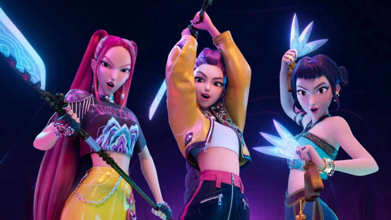 KPop Demon Hunters girl group fiercely poses with their weapons.