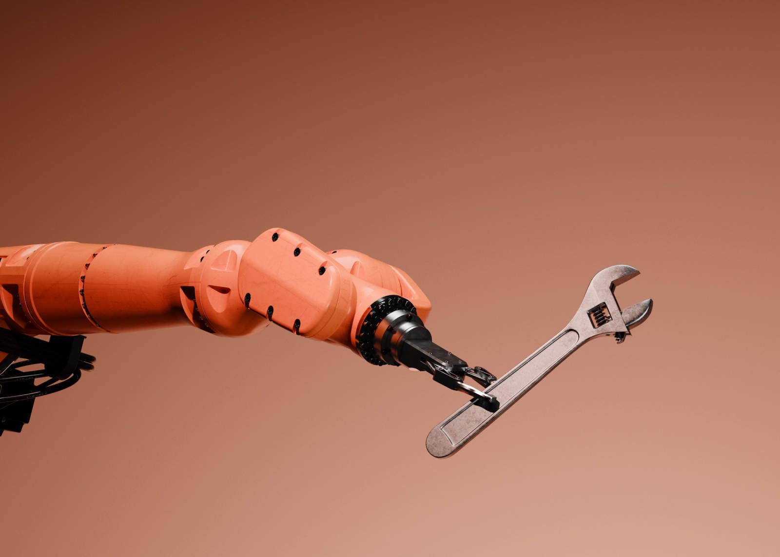 Conceptual image of a robotic arm holding a wrench.