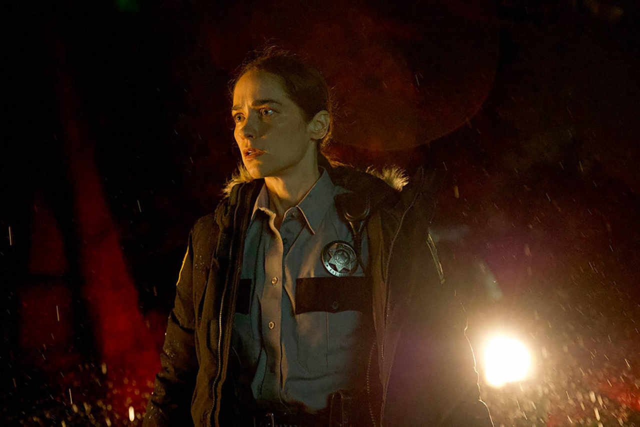 revival lands on netflix a 10 episode small town zombie mystery worth your weekend Inside a jammed police station, a woman gestures toward the teenage girl next door — black clothes, goth makeup — and wants to know whether she's one of the risen dead.