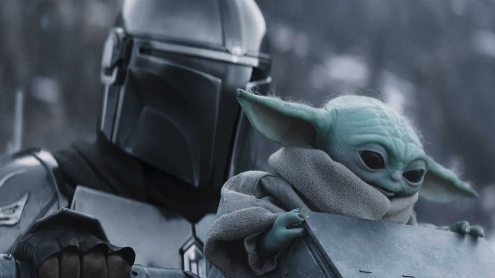 Mando and Grogu on a walker in The Mandalorian and Grogu