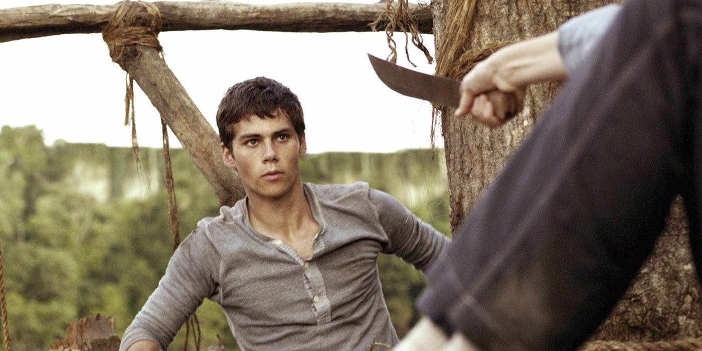 12 Years On, The Maze Runner Has Become A Streaming Powerhouse Again 26 Thomas from Maze Runner threatened with a knife