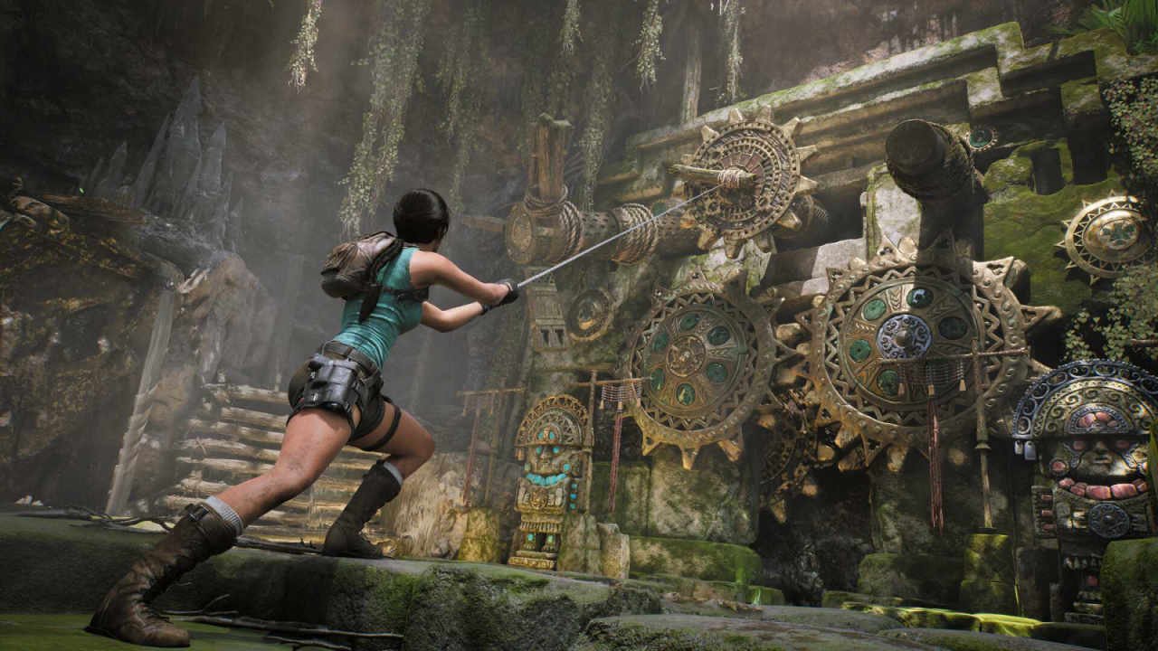 Lara Croft yanks a gear with a hook in Tomb Raider: Legacy of Atlantis.