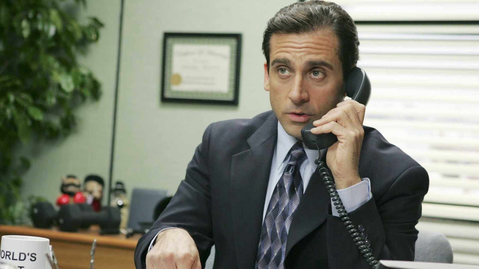 Michael Scott (Steve Carell) on the phone in The Office.