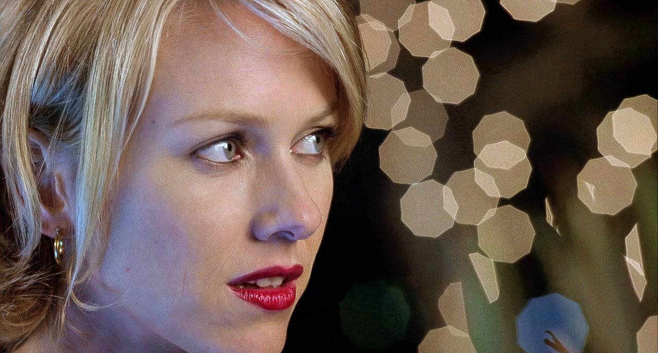 Betty looks at someone offscreen in Mulholland Drive