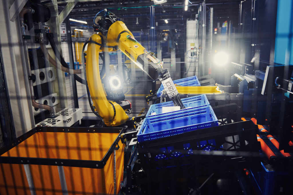 A robotic arm system called Sparrow can handle millions of different products while packing container-size totes.