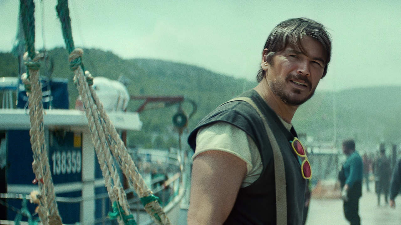 below review josh hartnett does his best but netflixs sea horror series still sinks The year is 1986. A family is hauling its whole house across the water, pulled along by a small boat with a sputtering motor, when the house begins to sink. Leo, the father, is dragged under with it, and young Calvin Penney cuts the line so the rest of the family survives. Down in the water, he glimpses something: a void, or perhaps the enormous eye of some huge creature.
