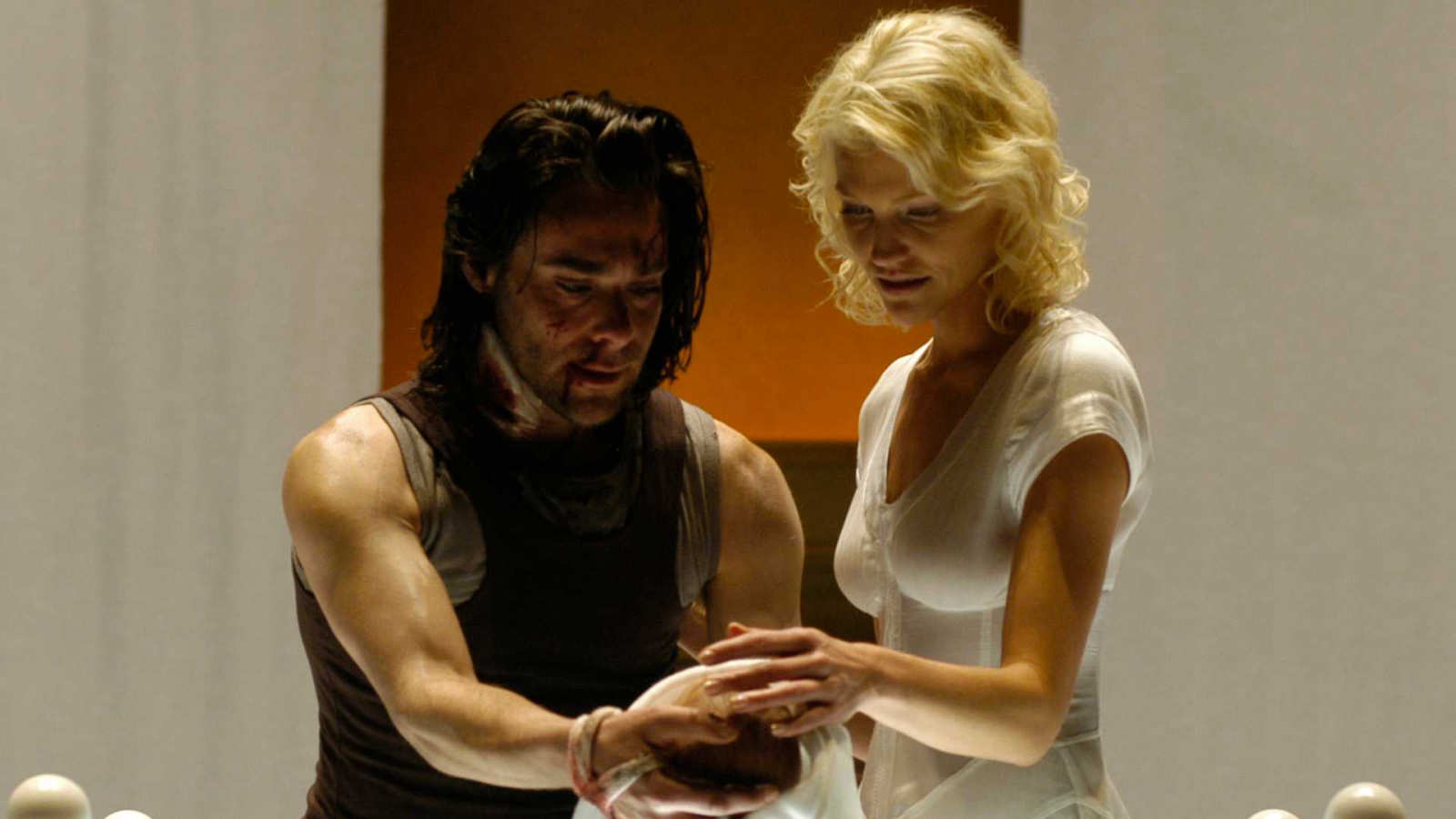 James Callis and Tricia Helfer in Battlestar Galactica